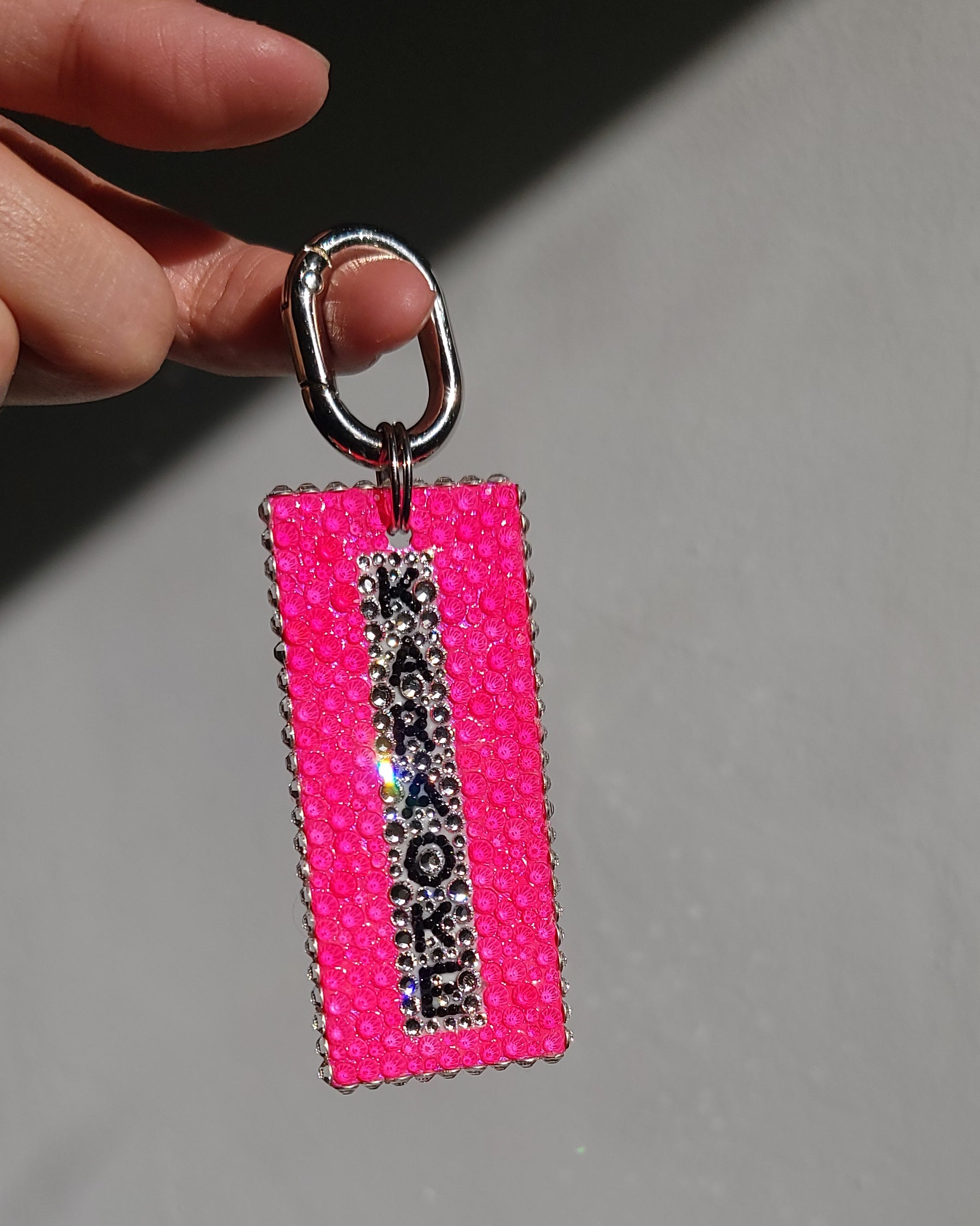 The English side of the Nightlife Karaoke Sign Keychain, featuring the word "karaoke" in English.